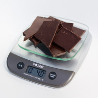 Food scale with 4 oz. semi-sweet chocolate on it